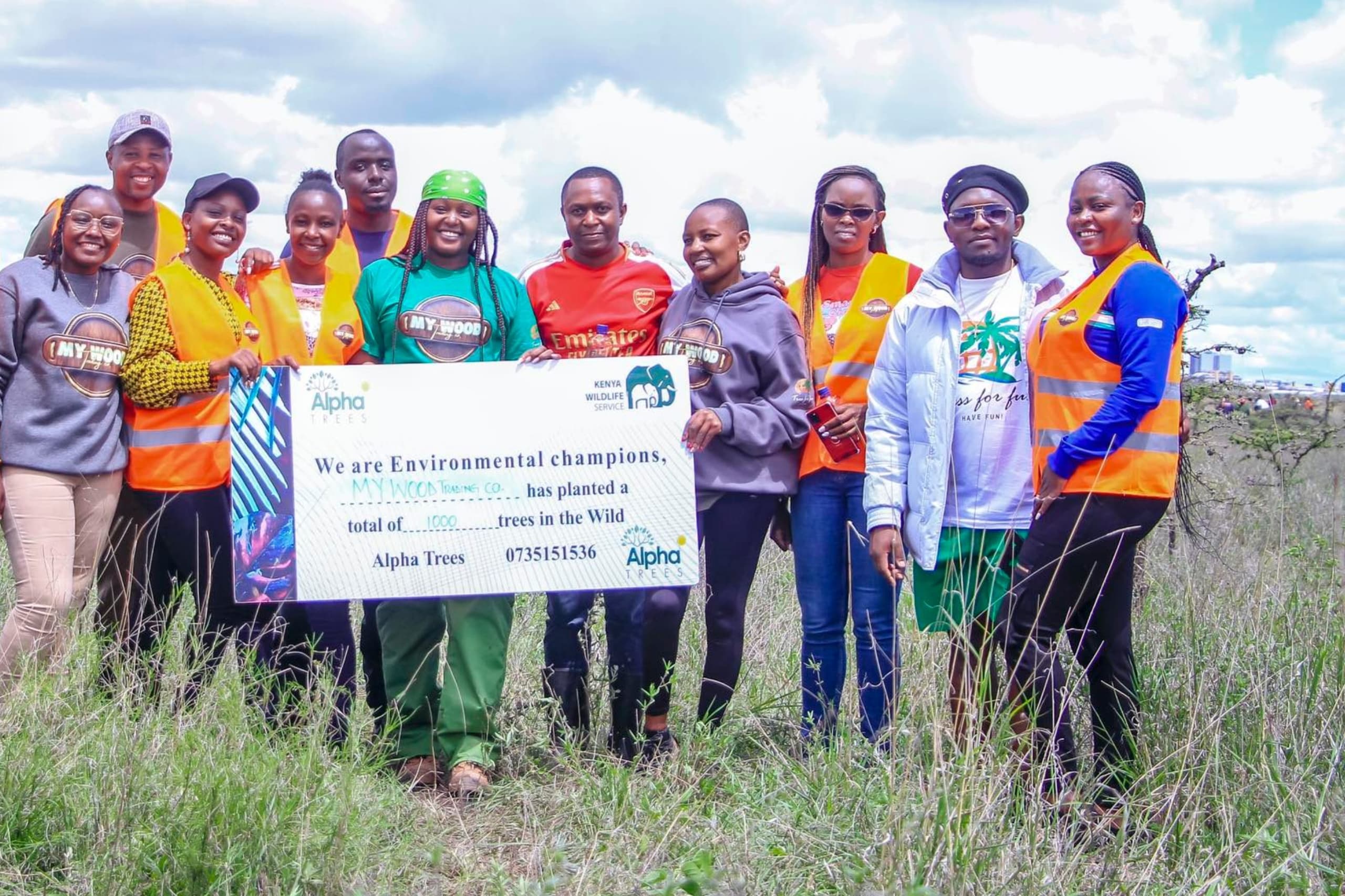 A group of people posing for a photo at a CSR event