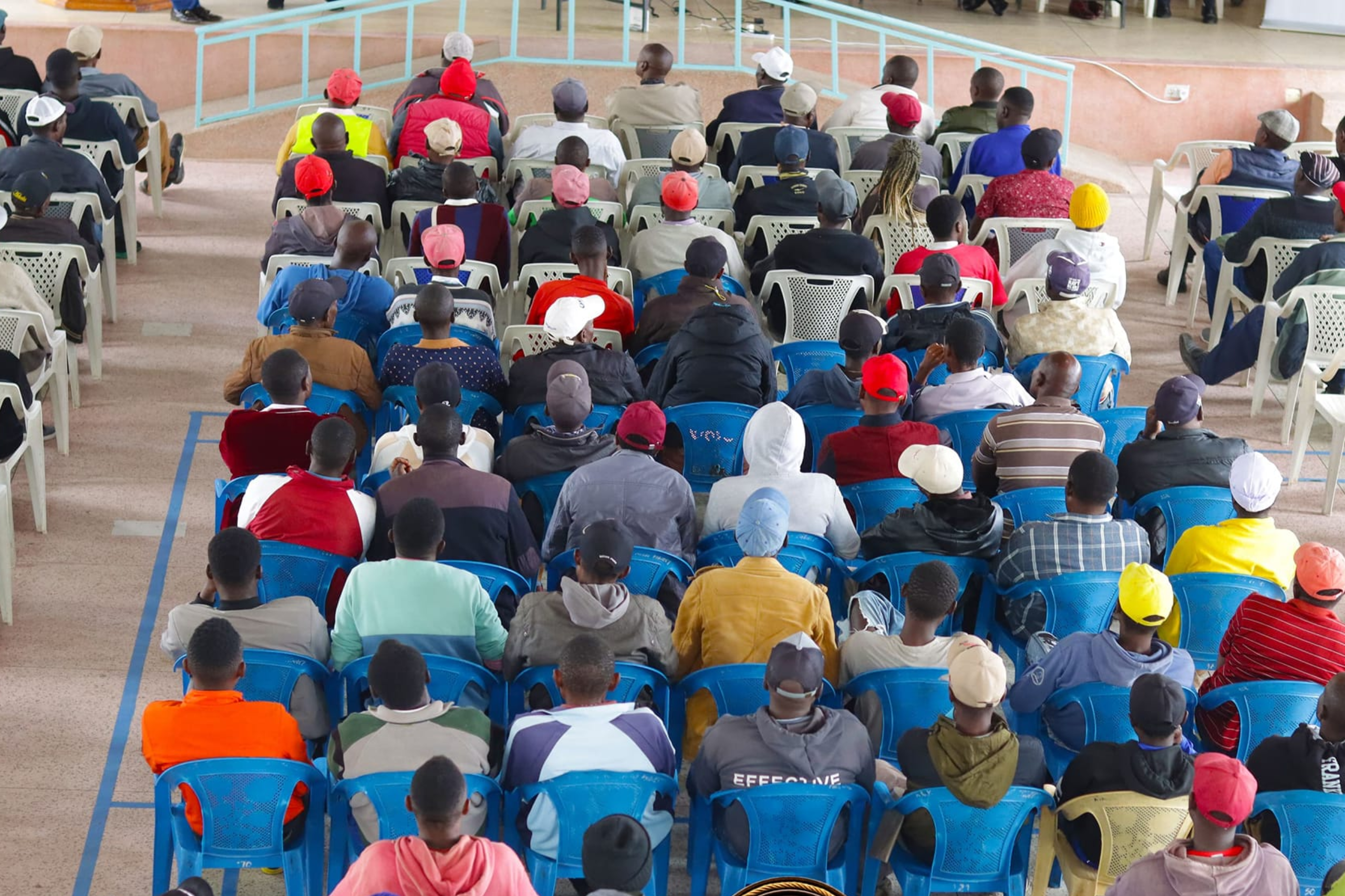 A group of people seated at a community development program event